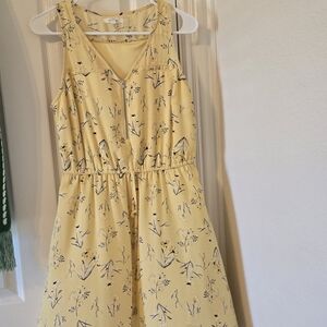 Maurice's yellow dress